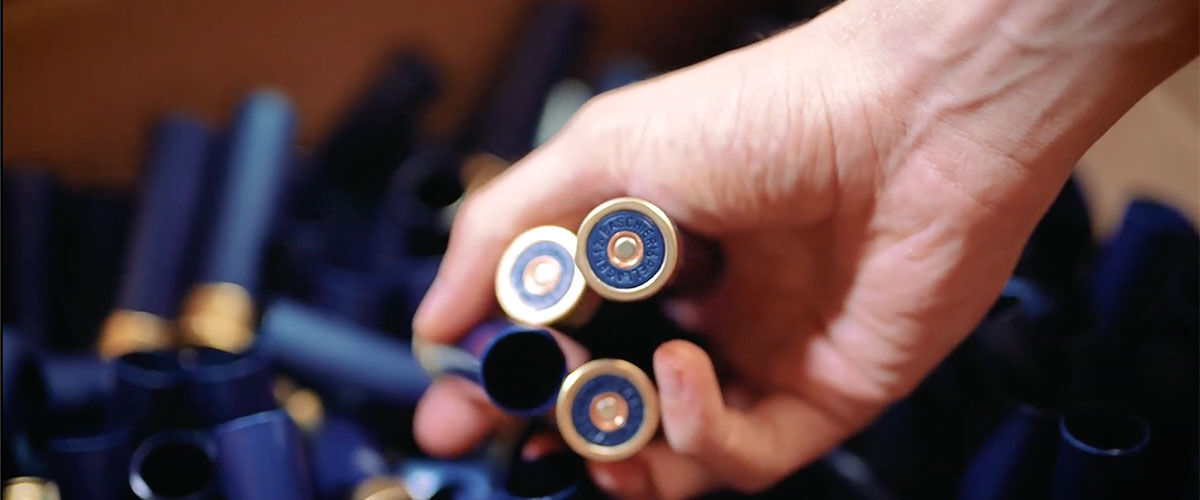 Person holding shotshell hulls