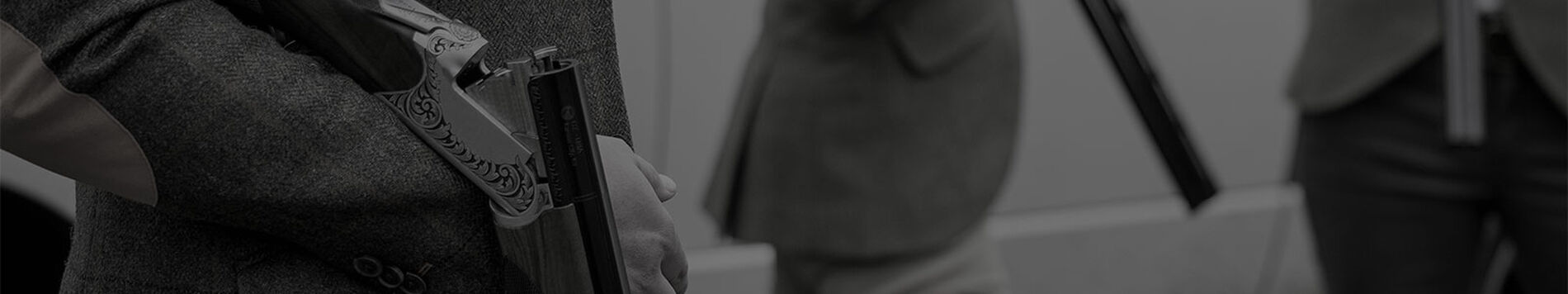 shooter aiming handgun