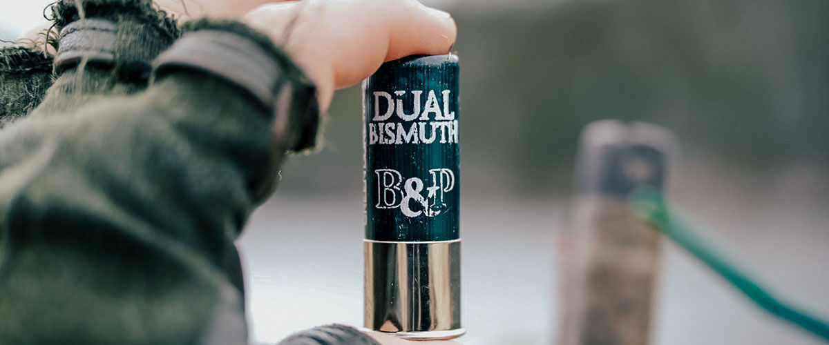 person holding Dual Bismuth shotshell