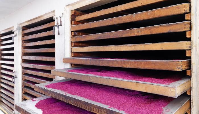 Pink powder sitting in racks